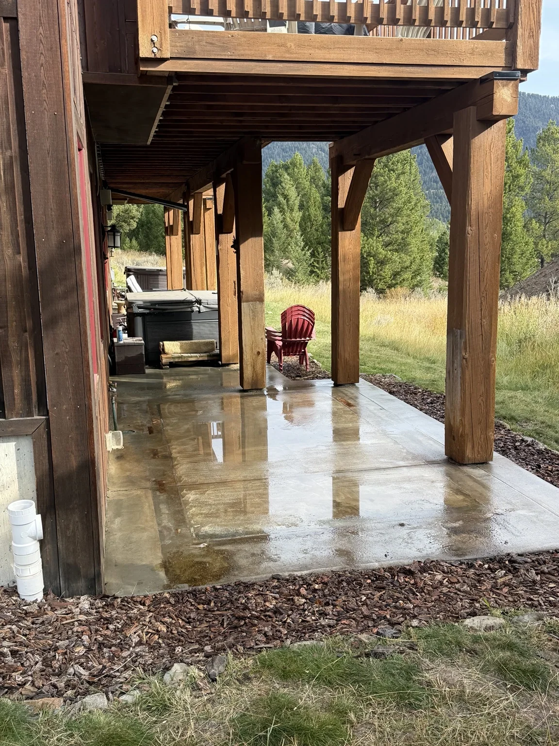 Patio cleared after hot tub removal — side view